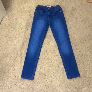 Dark blue jeans, rarely worn